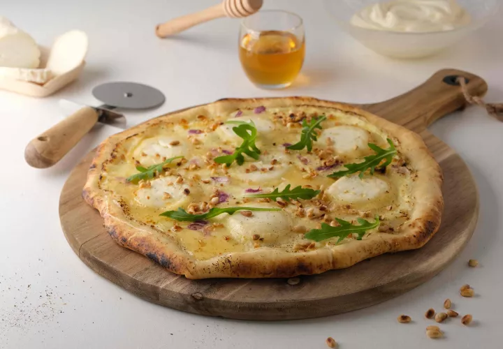 Recette de Pizza chèvre miel et roquette